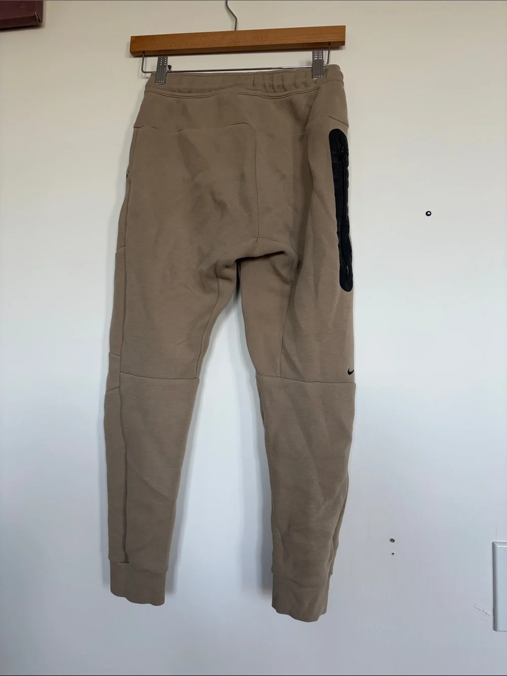 Nike Beige Pants with Light Blue Jeans and Brown Joggers